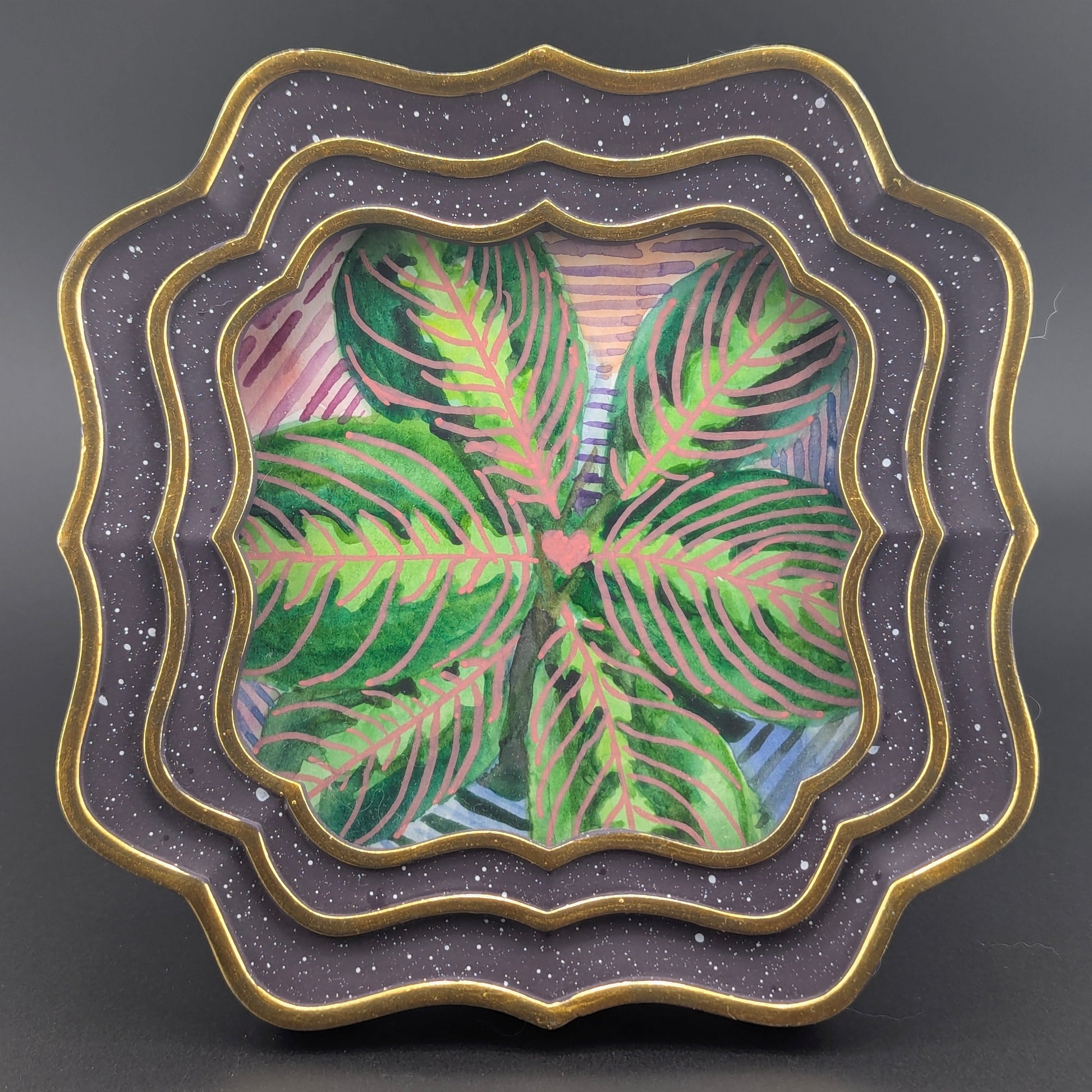 Decorative plate with a floral design on a gray background